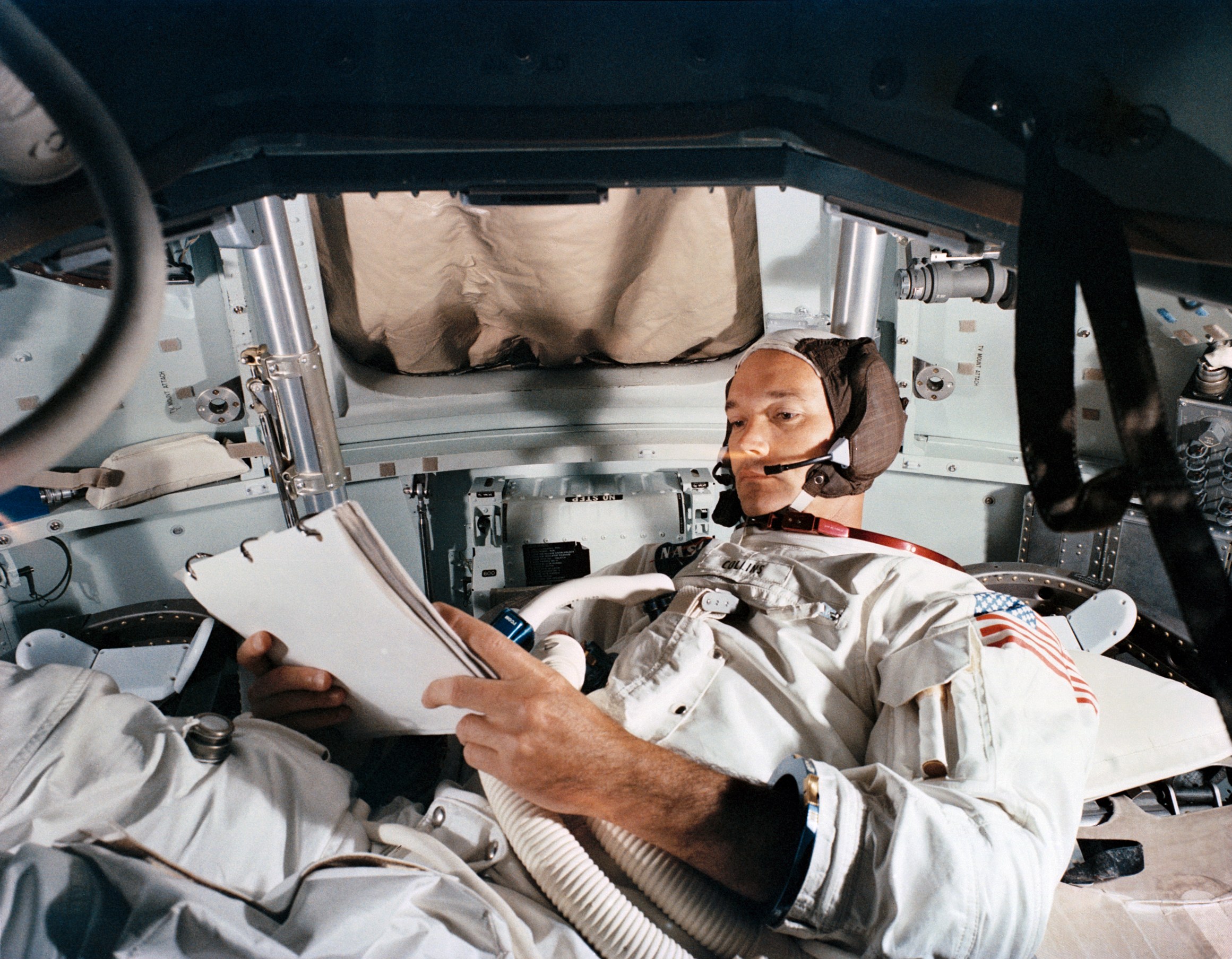 Astronaut Michael Collins practices in the command module simulator on June 19, 1969.