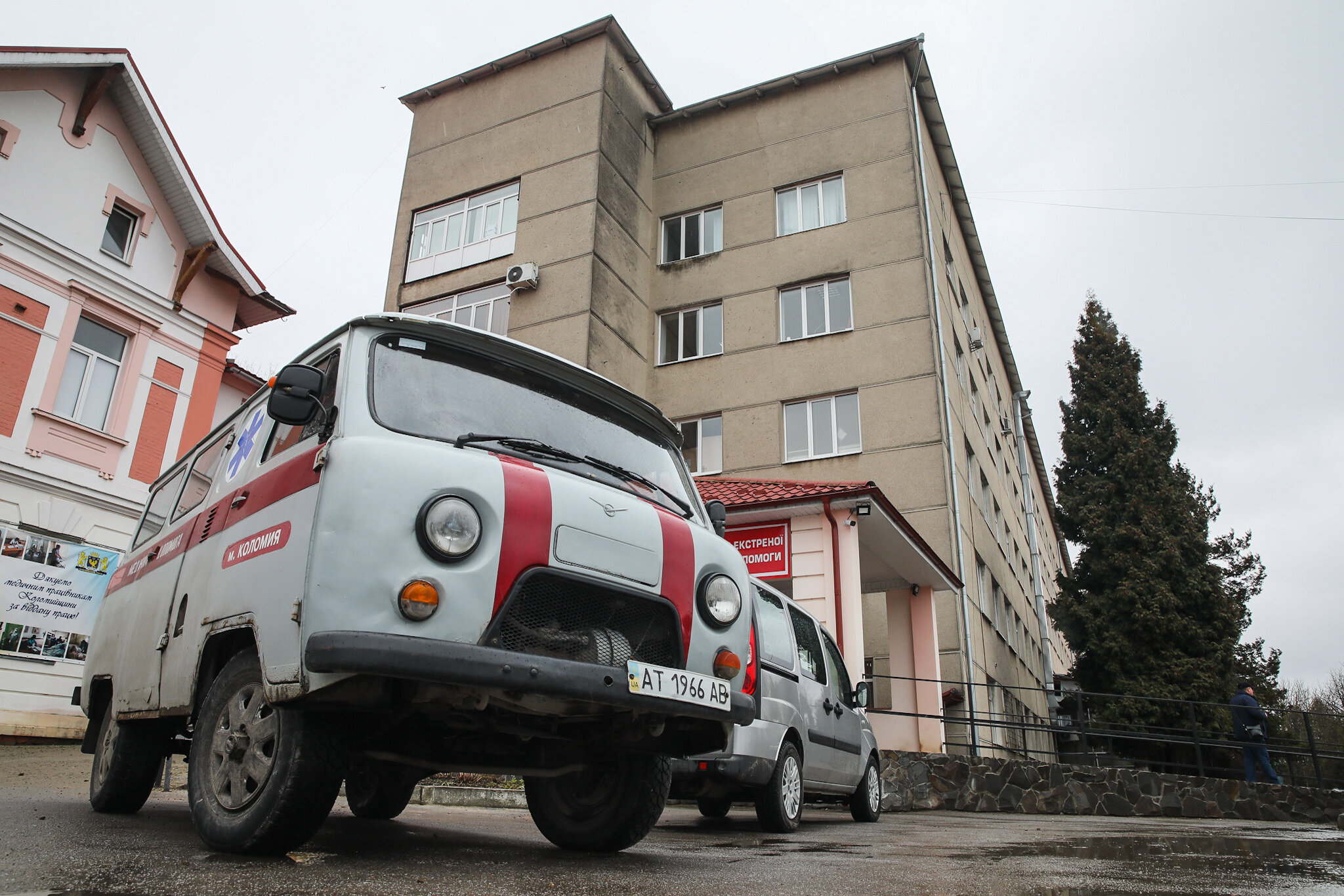An ambulance is parked near the building of Kolomyia District Hospital in Ivano-Frankivsk Oblast on March 16, 2021.