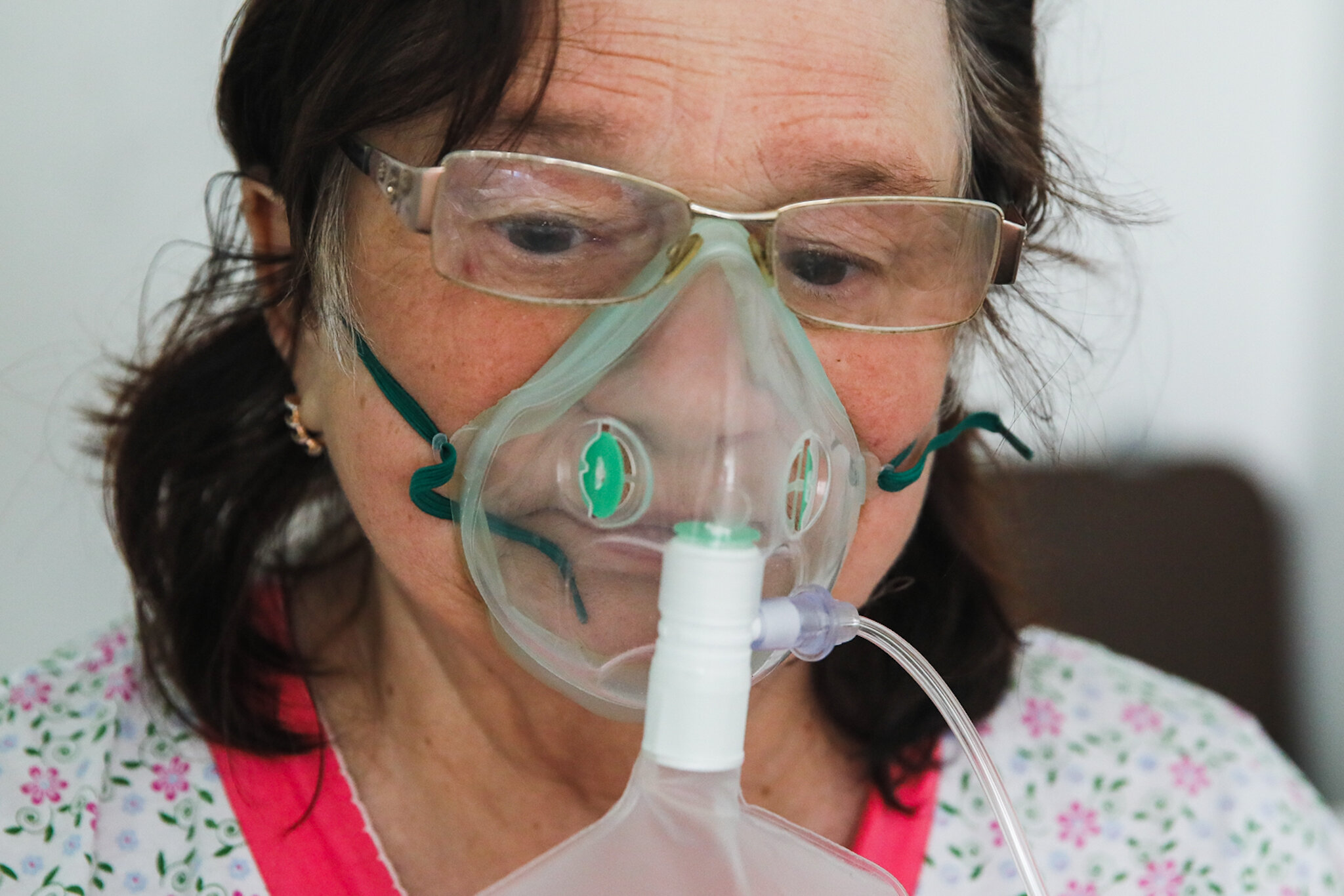 A coronavirus patient wears an oxygen mask at Kolomyia District Hospital in Ivano-Frankivsk Oblast. on March 16, 2021.