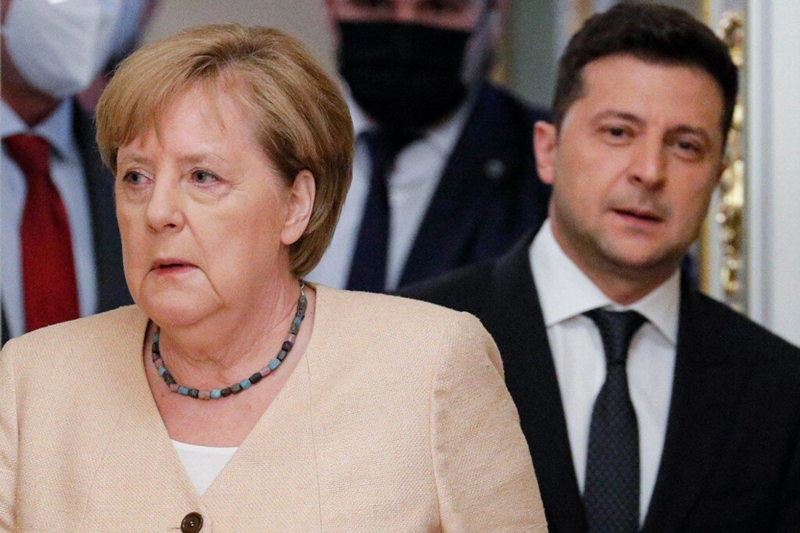 German Chancellor Angela Merkel (L) and Ukrainian President Volodymyr Zelensky arrives for a joint news conference following their talks at the Mariinsky palace in Kyiv,on August 22, 2021. 