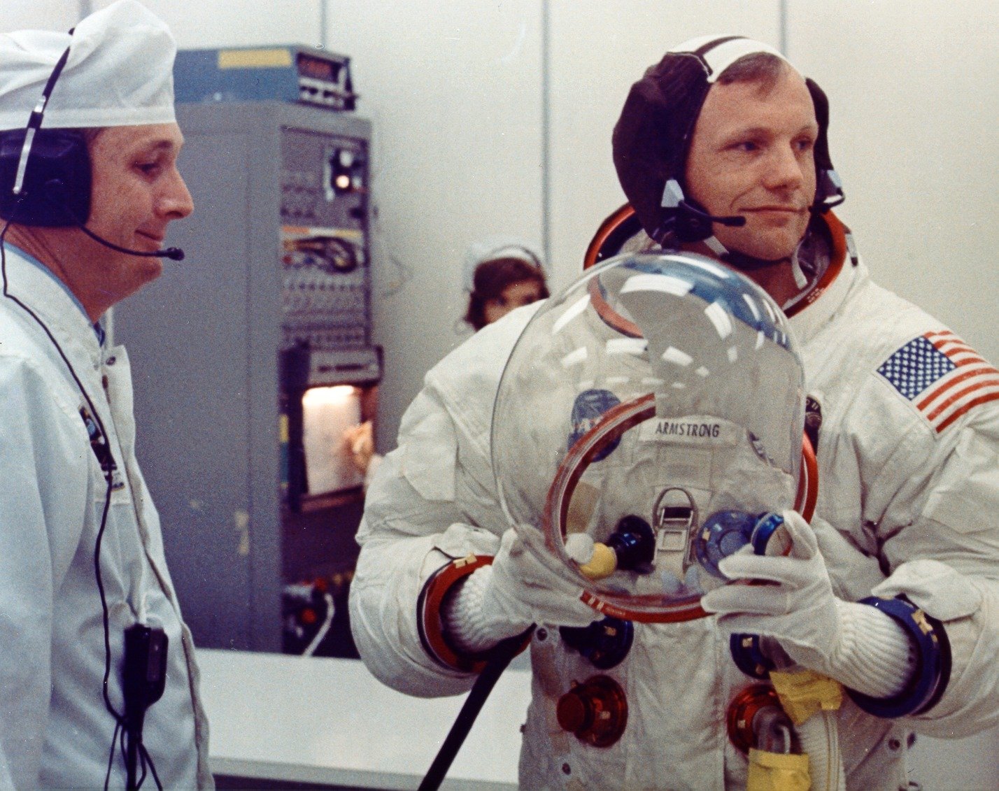 Neil Armstrong (R) and suit tech Troy Stewart (L) during pre-flight suiting on July 16, 1969.