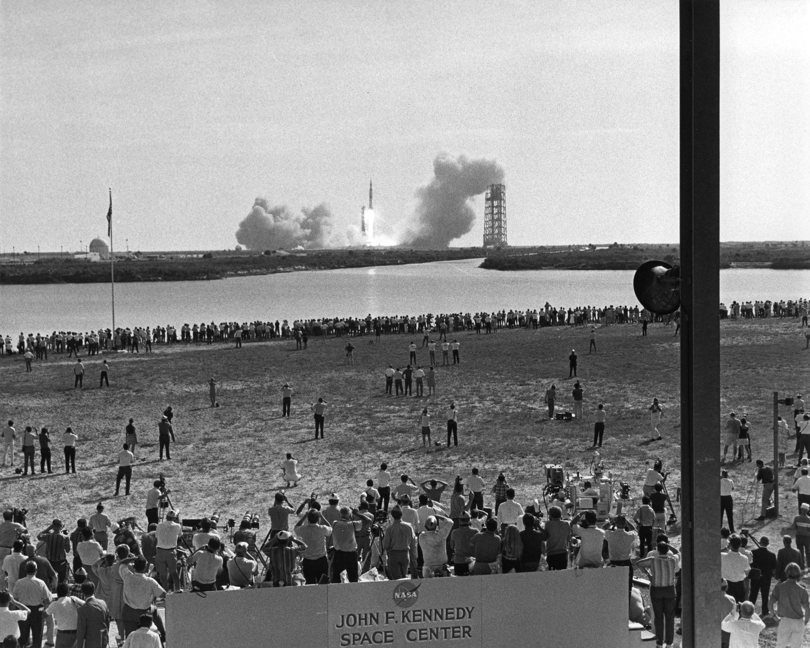 Spectators observe the Apollo 11 start to the Moon on July 16, 1969.
