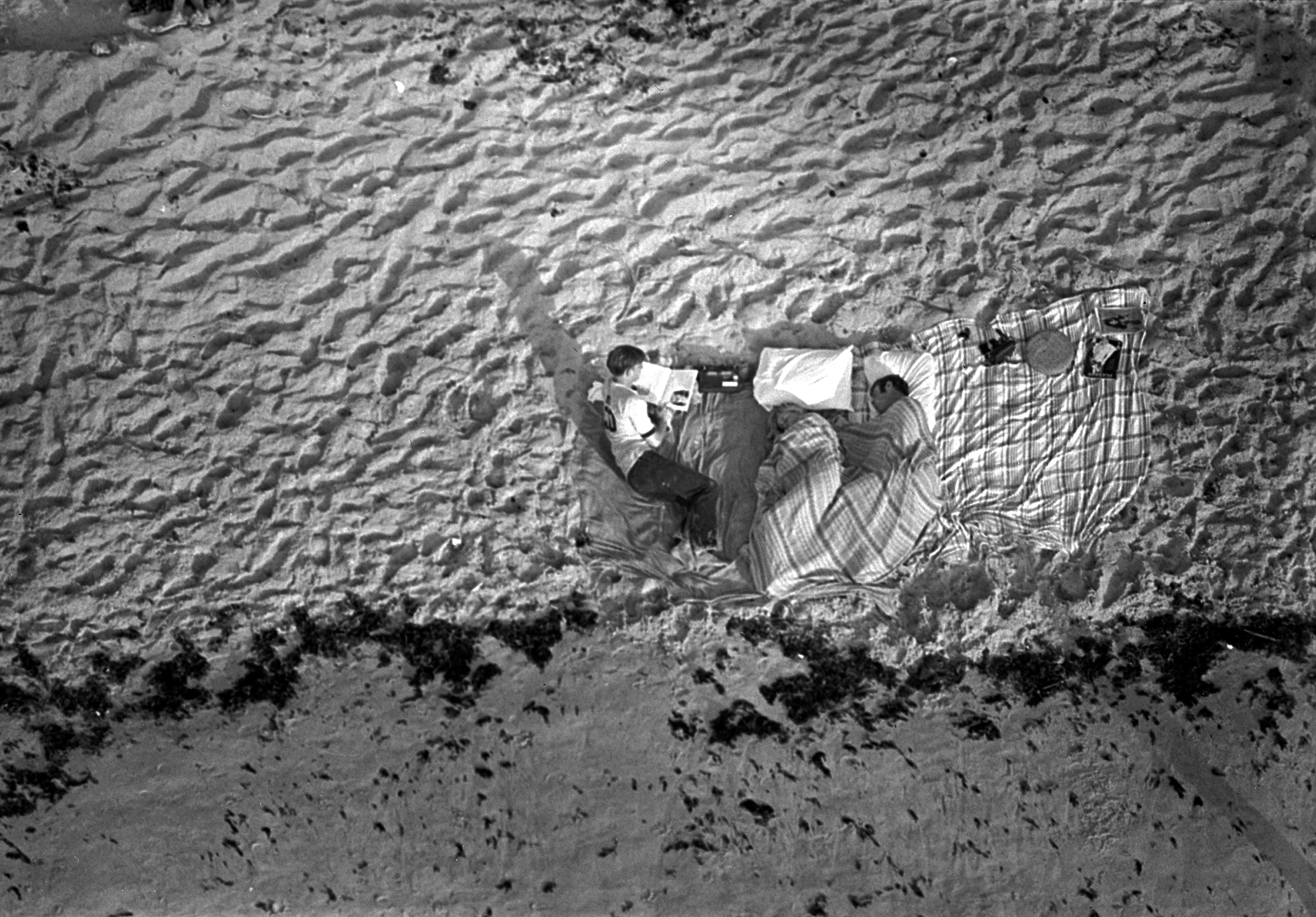 Apollo 11 launch spectators sleep on a beach close to the Kennedy Space Center on July 16, 1969.