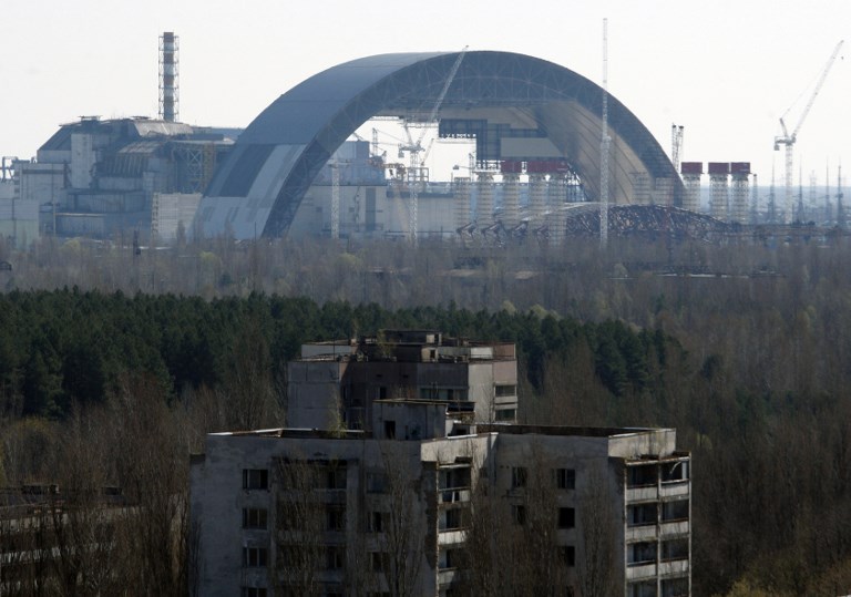 The first half of the Chornobyl New Safe Confinement, or NSC, an arch that which will cover the reactor building, is seen after it was pushed to its site at the Chornobyl Nuclear Power plant on April 3, 2014. 