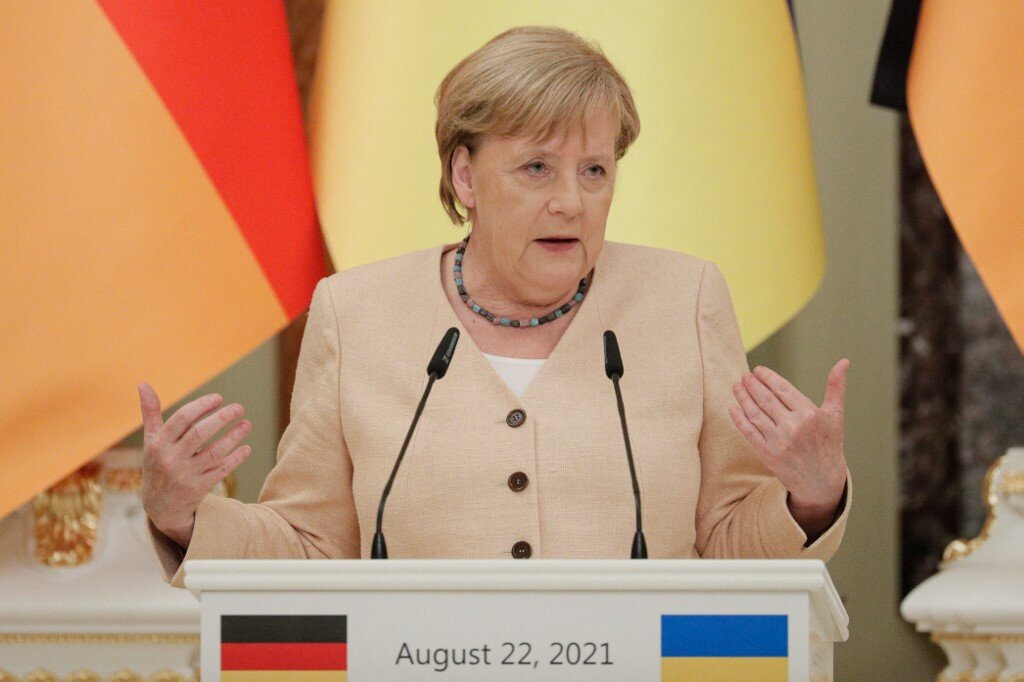 German Chancellor Angela Merkel gives a joint news conference with Ukrainian President following their talks at the Maryinsky Palace in Kyiv, on August 22, 2021. 