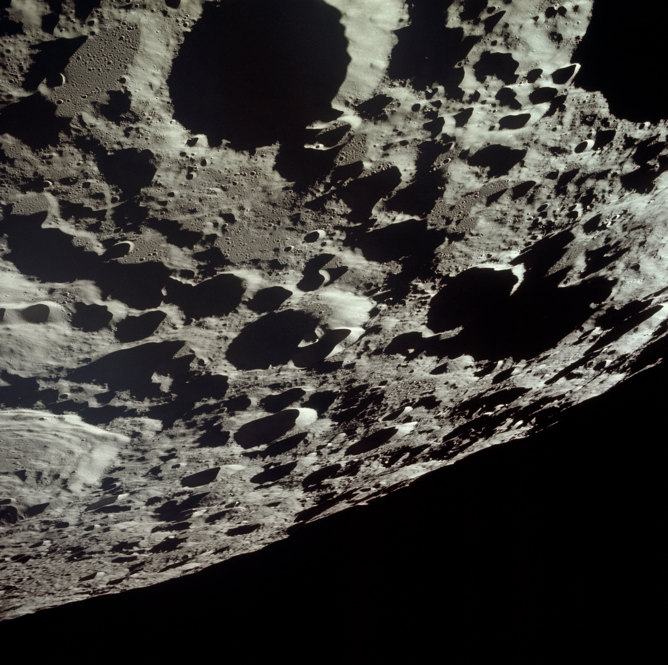 A view to the Moon surface pictured during the Apollo 11 orbiting the celestial body circa July 20, 1969.