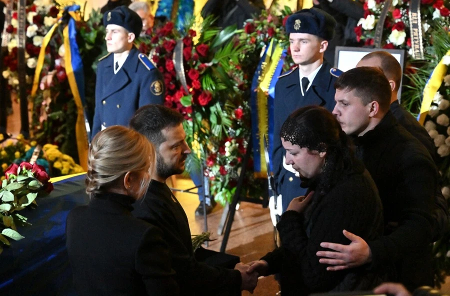 Germany Faces Backlash, Funeral in Kyiv, and Military Realities - AFP Roundup