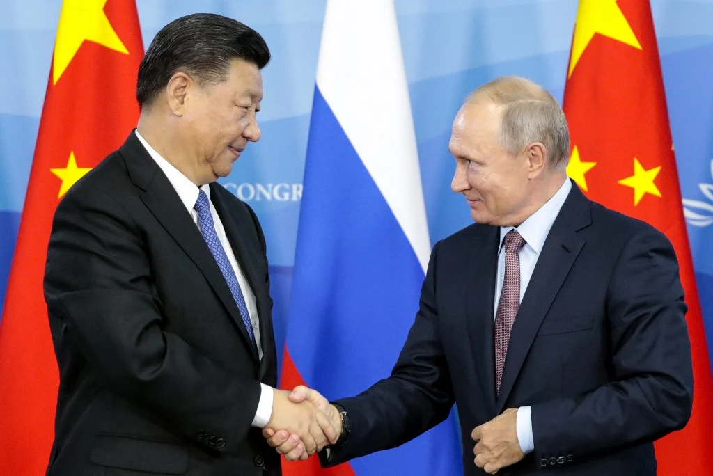 Xi, Putin Hail Ties Ahead of 'Journey of Peace' to Moscow