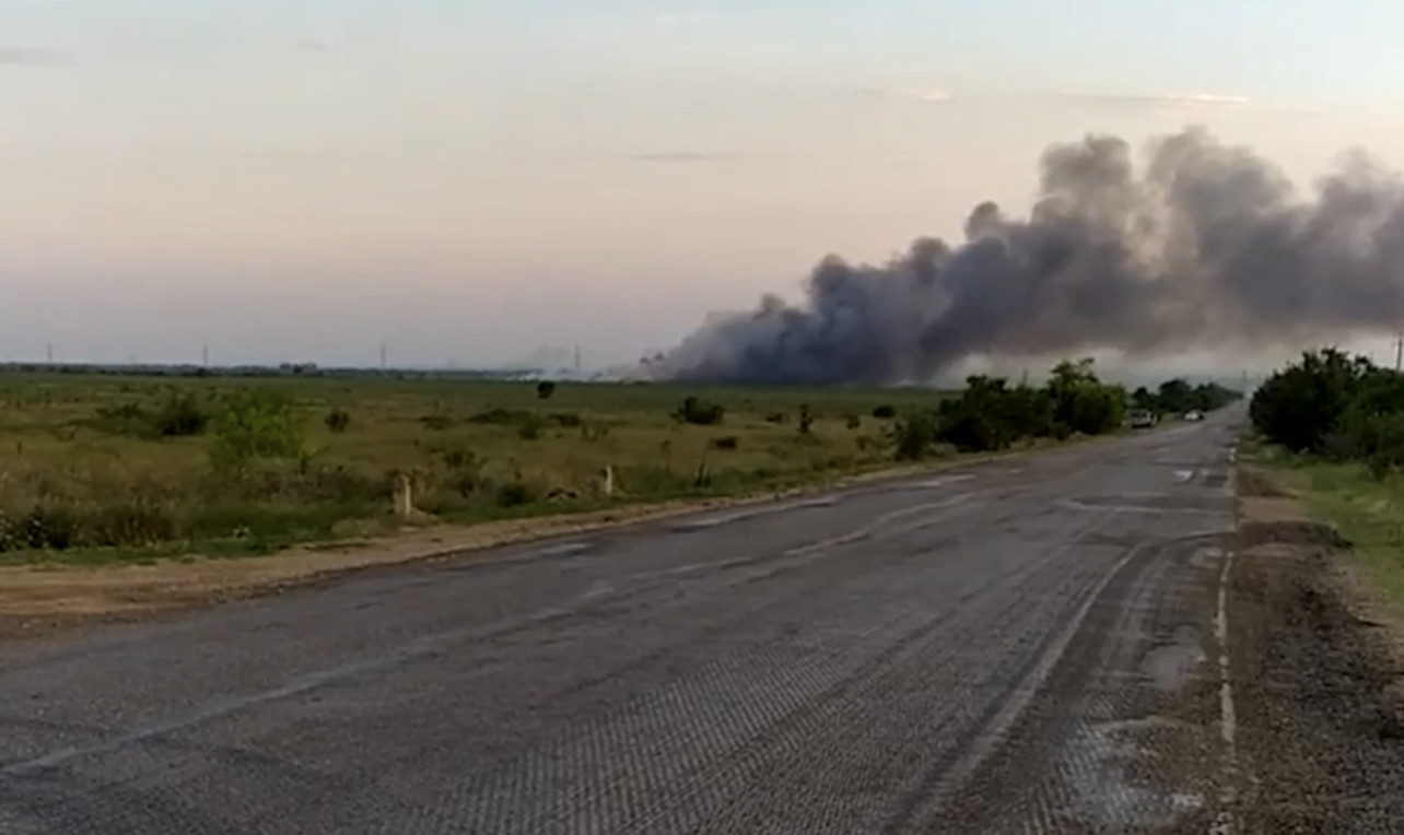 Suspected Ukrainian Strike Ignites Russian Ammo Dump in Crimea, Fire ...