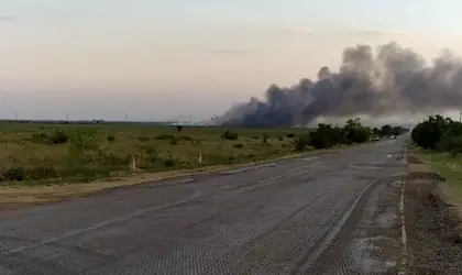Suspected Ukrainian Strike Ignites Russian Ammo Dump in Crimea, Fire Rages, Villages Evacuated
