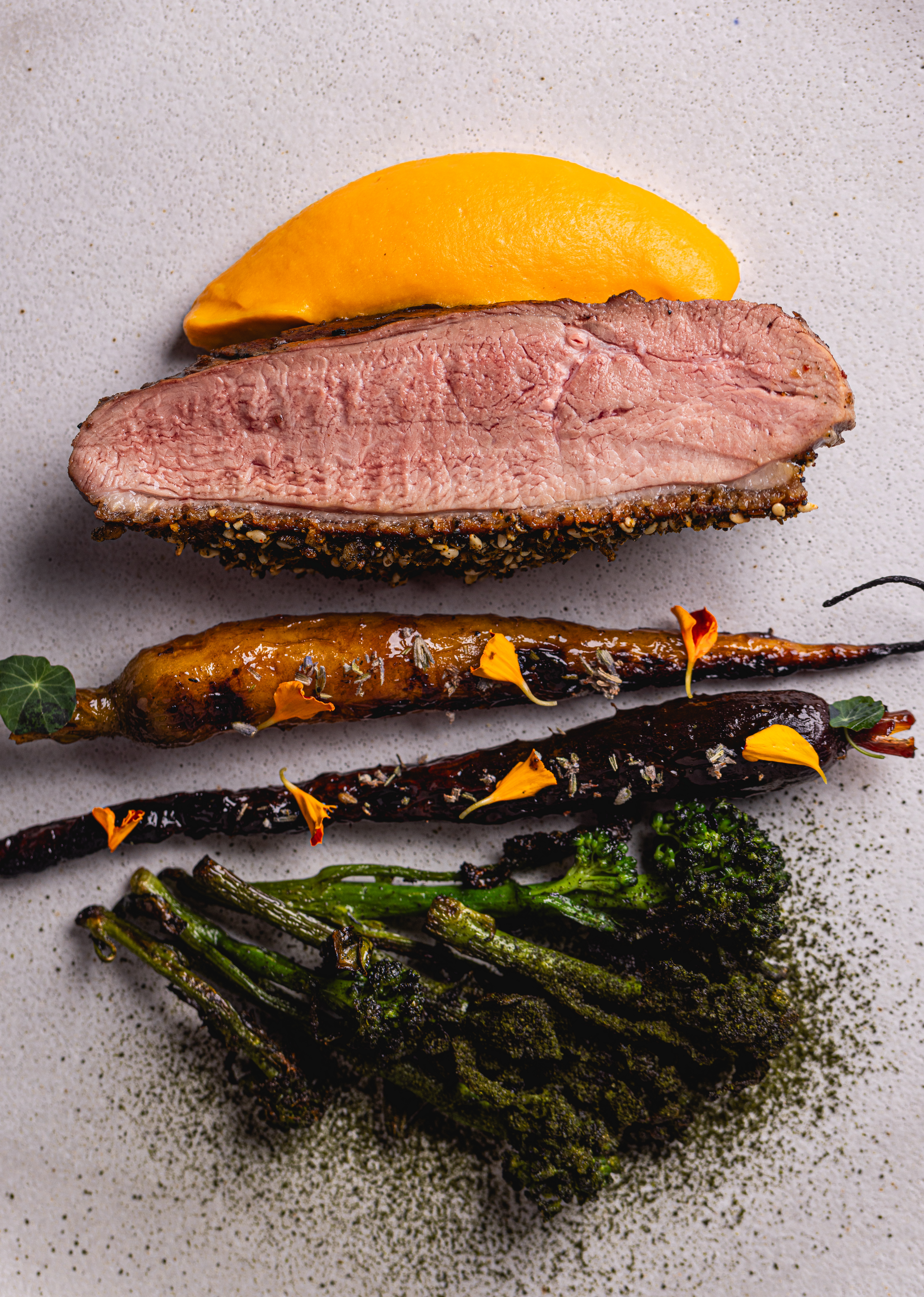 Duck with colorful carrots, quince and kvass