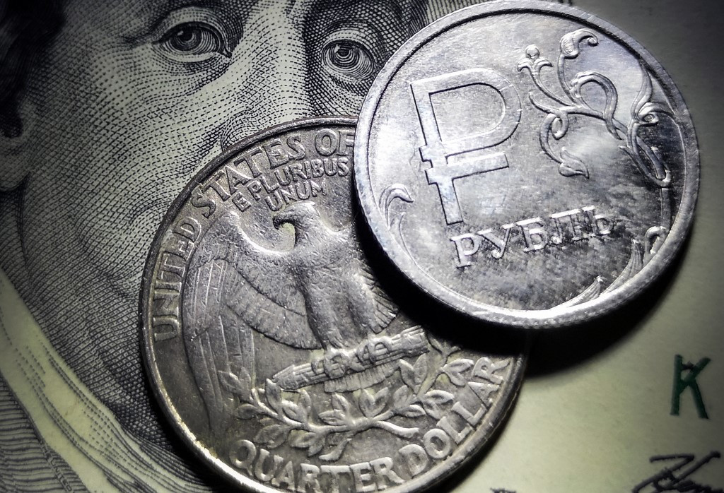 Putin Says ‘Deliberately’ Curbing Economic Growth