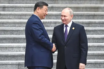 Xi, Putin Hail Ties as 'Stabilising' Force in Chaotic World