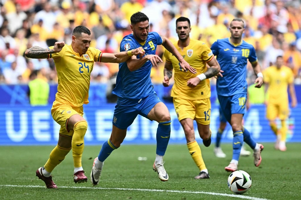 Romania Sinks Error-Prone Ukraine to End Long Drought at Euros