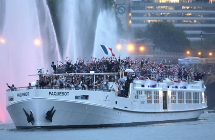 Historic River Parade, Dion Show-Stopper Ignite Paris Olympics