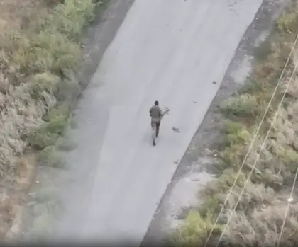 WATCH: Russian Soldier Catches and Runs with Ukrainian FPV Drone Until It Detonates in His Hands