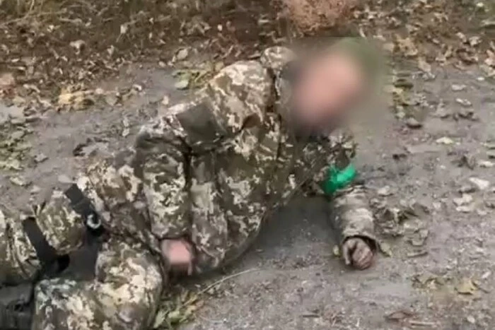 GRAPHIC: Russians Execute Wounded Ukrainian Prisoner, Kyiv Says