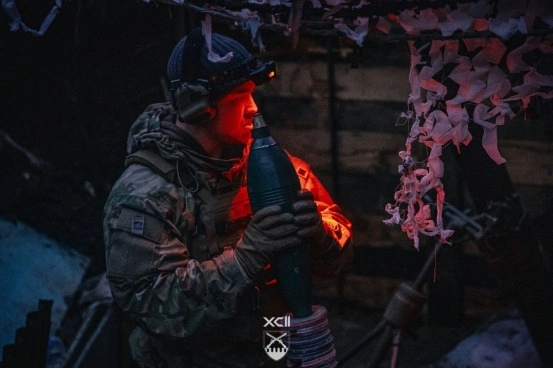 Mortar man in action, night operations, 92nd Assault Brigade. Probably Kharkiv sector.