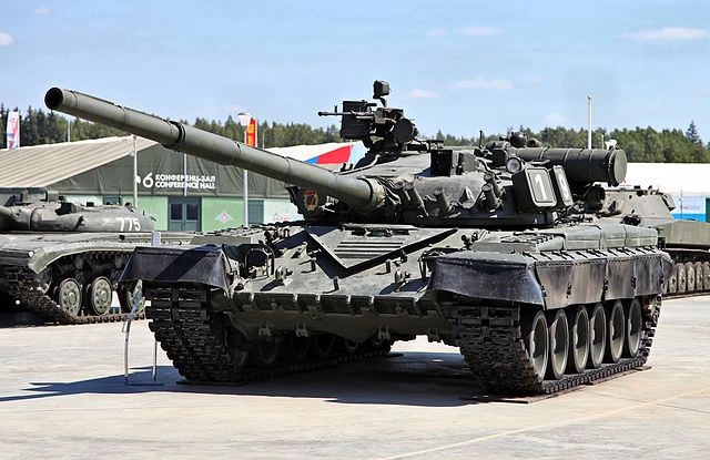 WATCH: Ukrainian Drone Destroys Russian Tank Hidden in Industrial Building