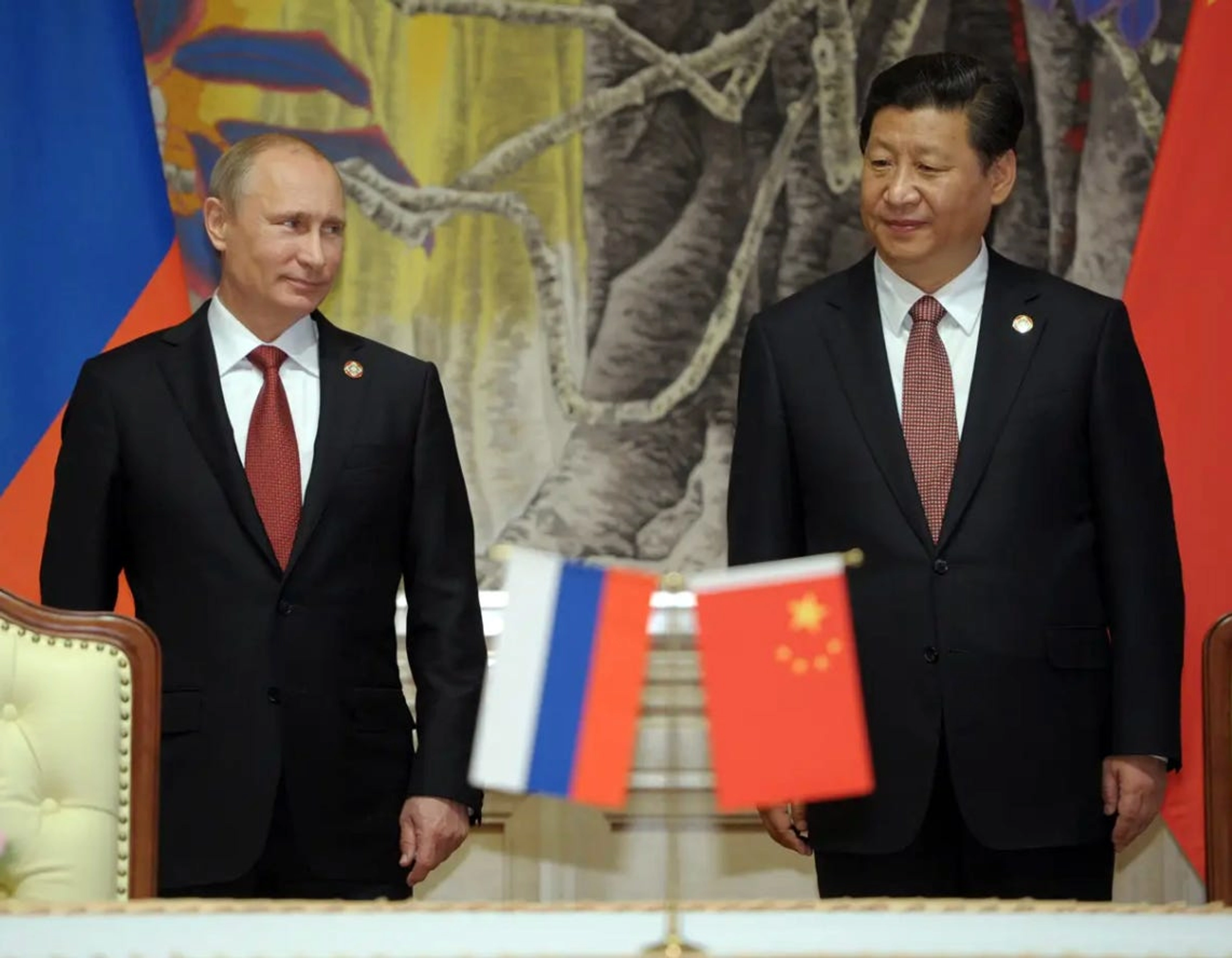 Xi Jinping and Putin have a long-running bromance. Xi started calling Putin his best friend in 2013. Xi is overjoyed with Putin meeting his wife. Note the look on Putin's face as he gazes at Xi in the bottom right hand corner.
