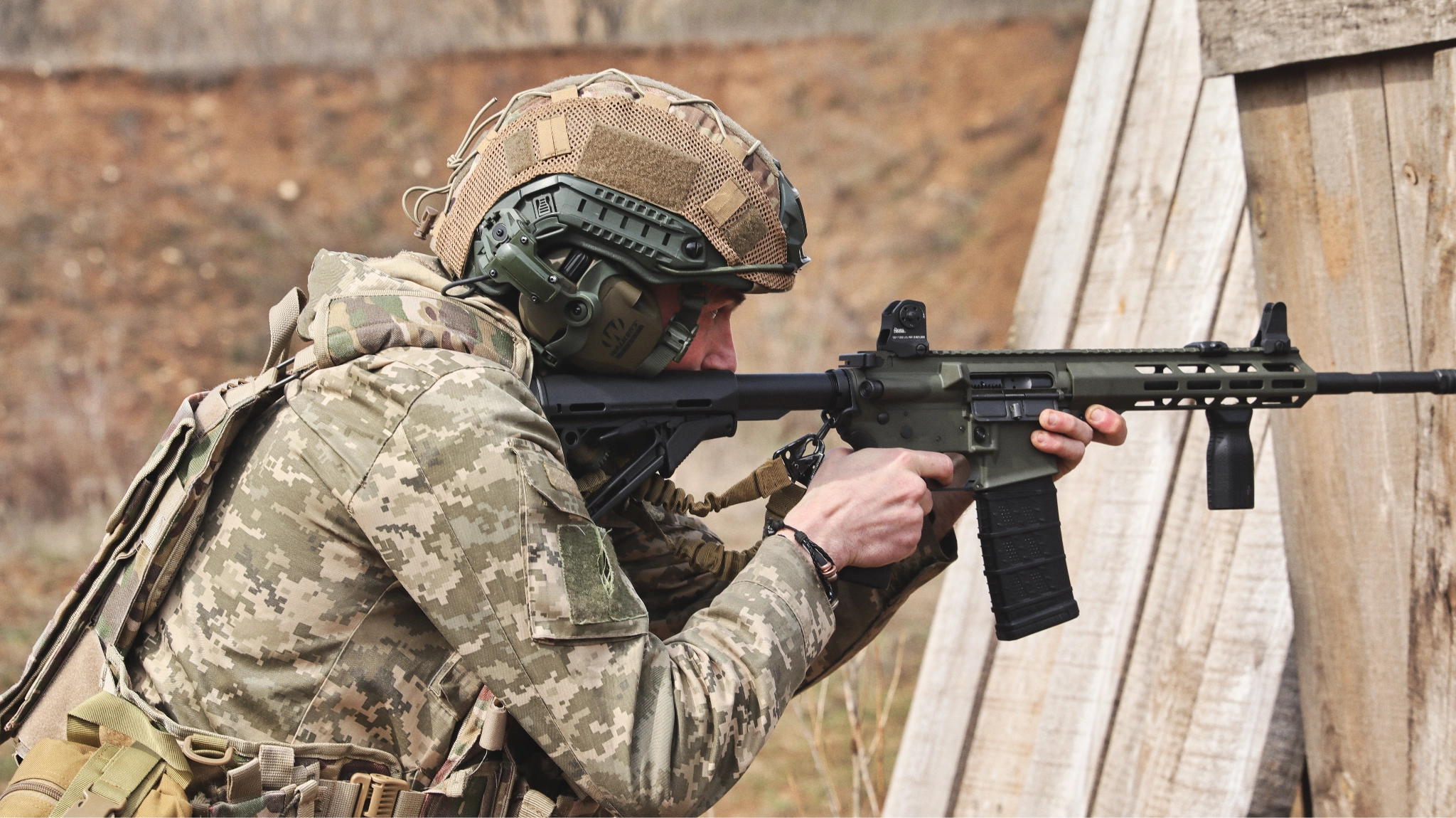 Khartia Brigade soldiers during a live-fire training exercise outside Kharkiv, April 2026. (Photo by Korbinian Leo Kramer)