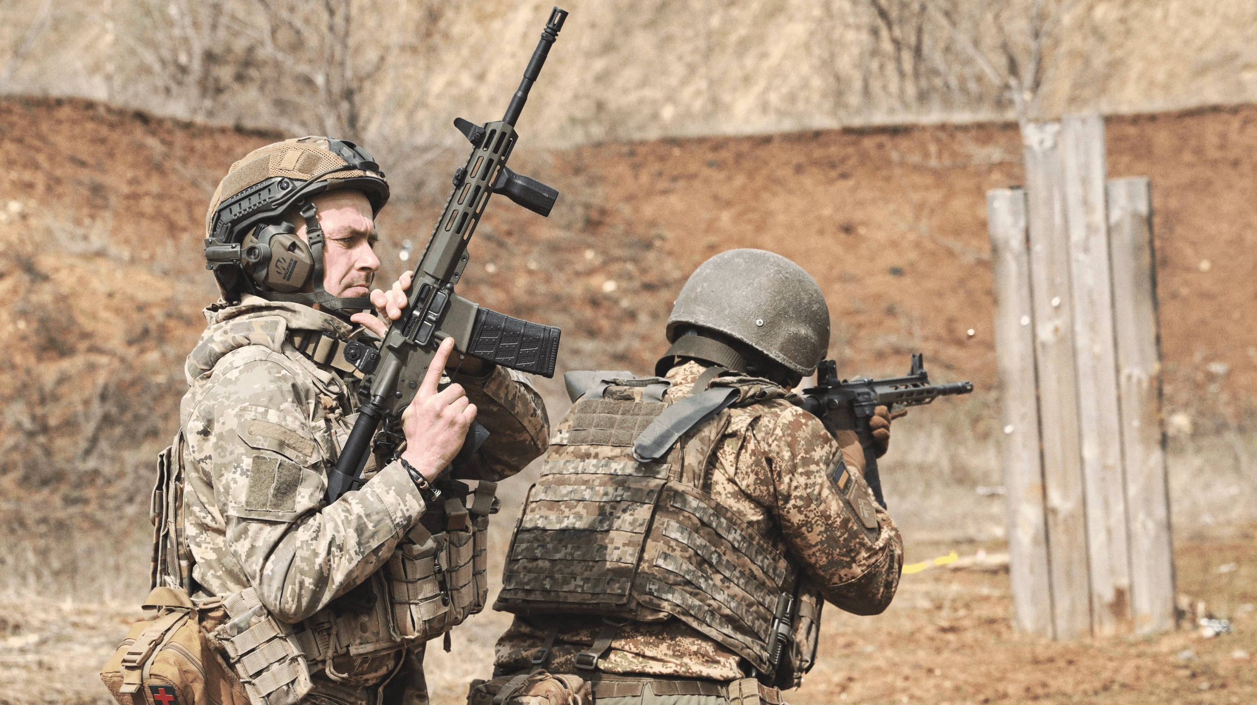 Khartia Brigade soldiers during a live-fire training exercise outside Kharkiv, April 2026. (Photo by Korbinian Leo Kramer)
