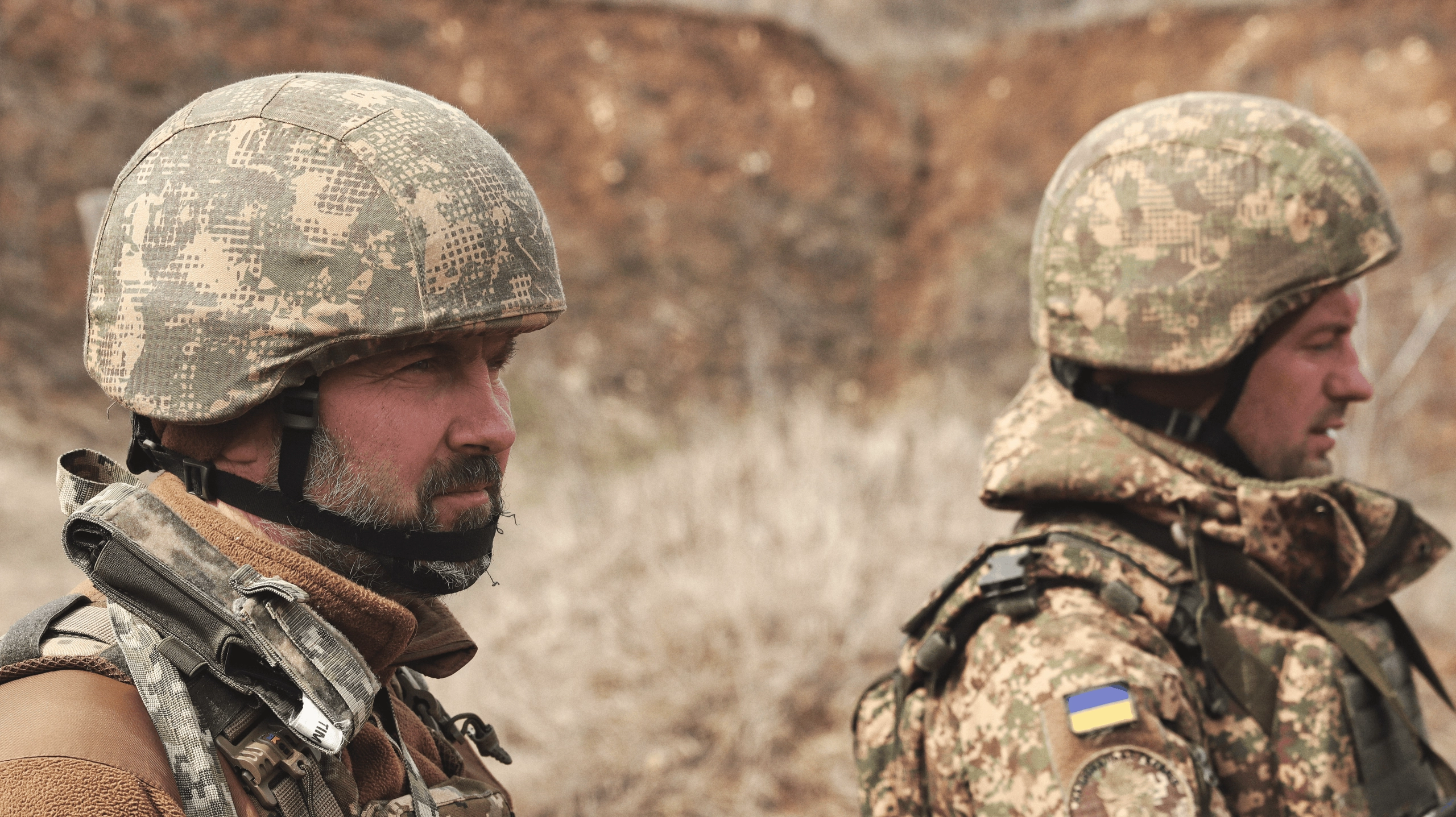 Khartia Brigade soldiers during a live-fire training exercise outside Kharkiv, April 2026. (Photo by Korbinian Leo Kramer)