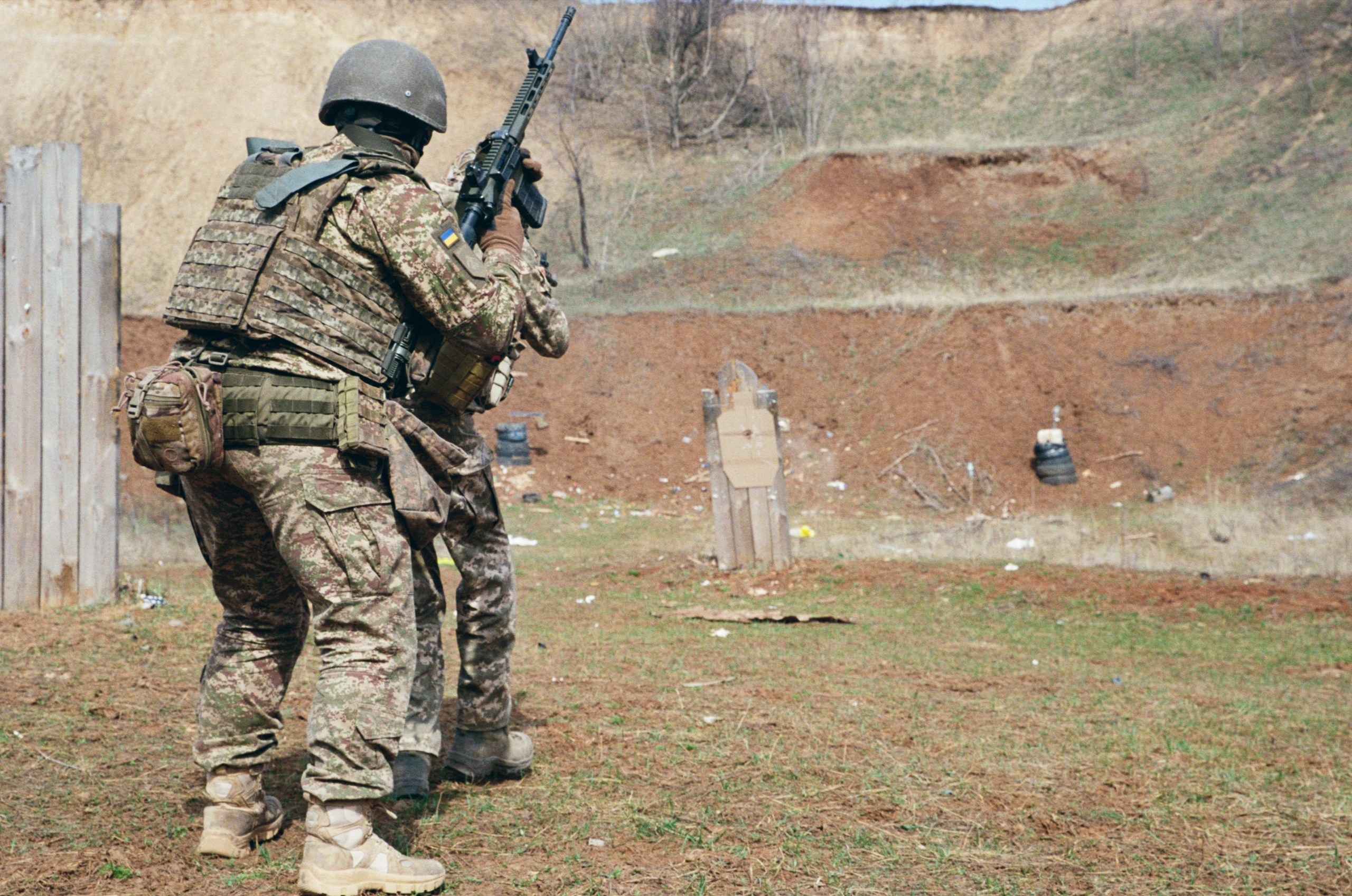 Khartia Brigade soldiers during a live-fire training exercise outside Kharkiv, April 2026. (Photo by Korbinian Leo Kramer)