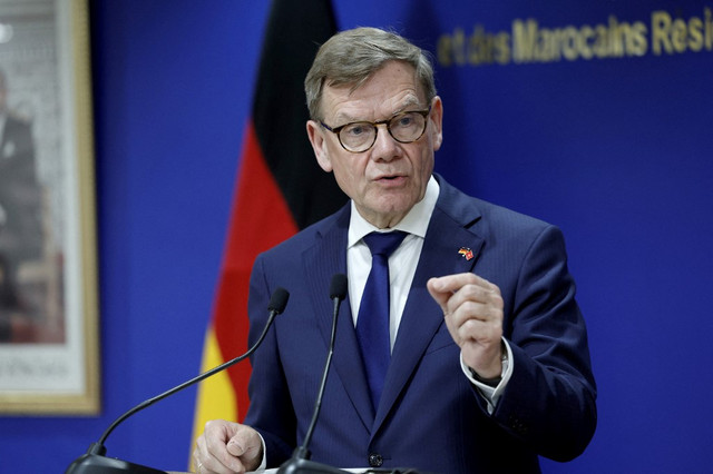 Germany’s foreign minister urges Ukrainian men in Germany to return home to fight