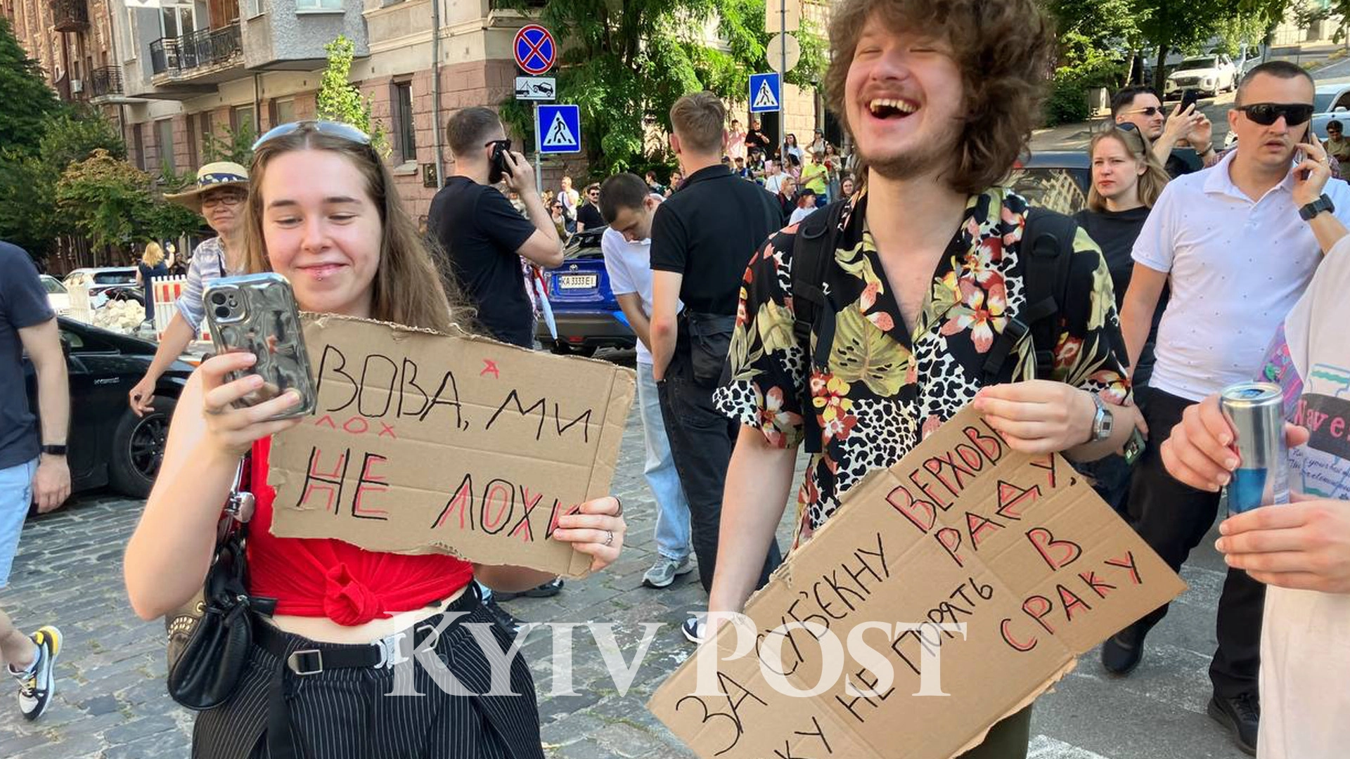 Photo: a protest against the dismissal of Defense Minister Mykhailo Fedorov gathered near the Ivan Franko Theater in Kyiv (Sergii Kostezh / Kyiv Post)