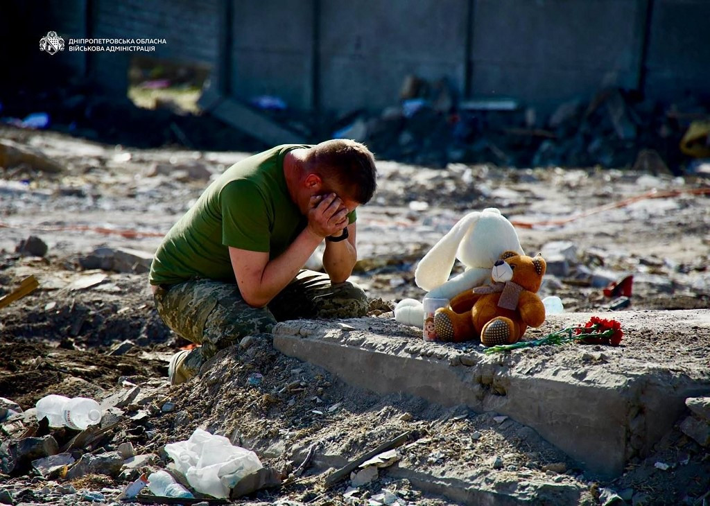 Toys and Flowers Cover the Ruins as Radushne Mourns Family Killed by Russian Missile